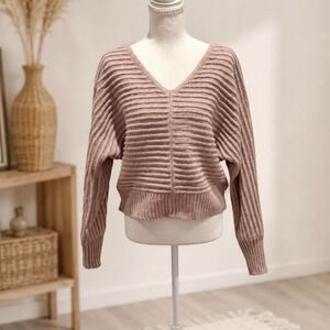 Pink ribbed knit sweater in a S